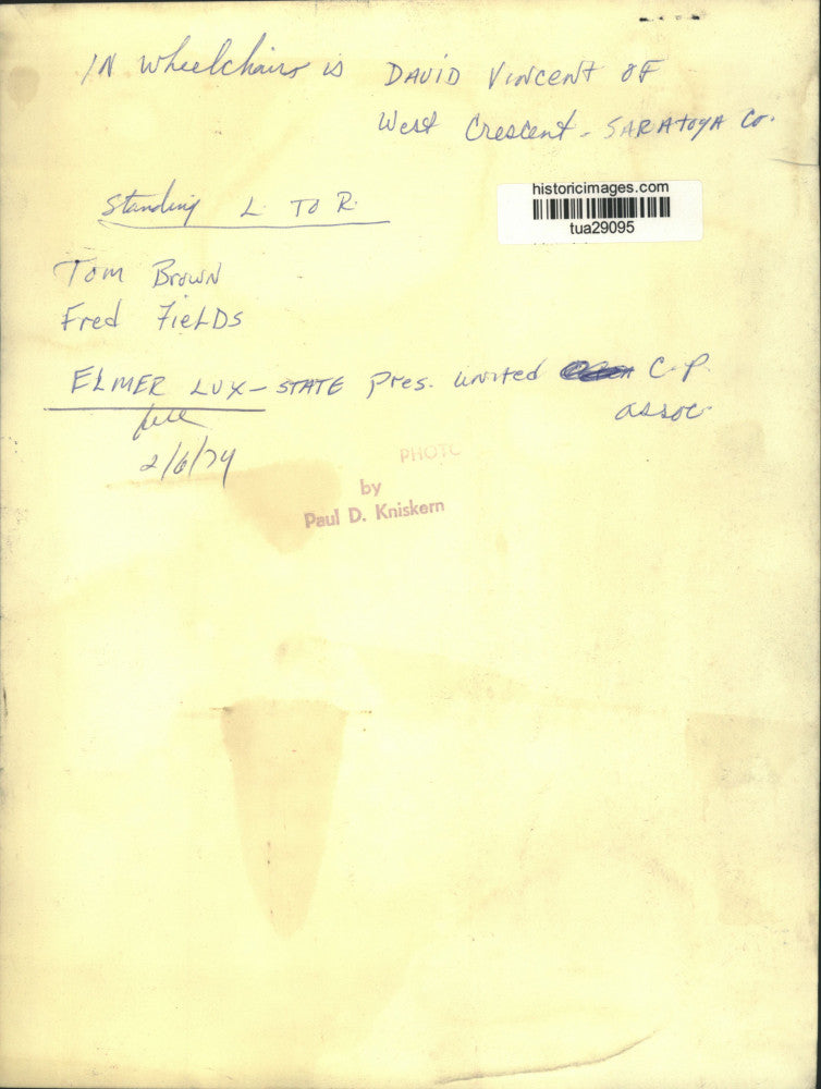 1974 Press Photo Cerebral Palsy officials greet man in wheelchair in New York