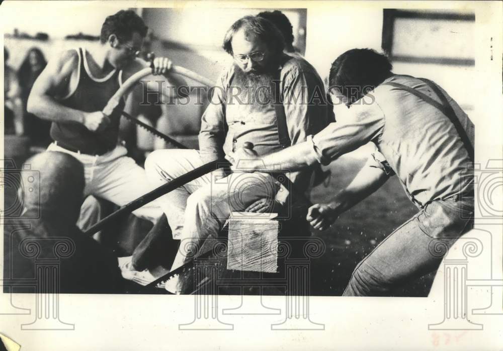 1979 Press Photo Men compete in lumberjack bow-sawing competition in New York