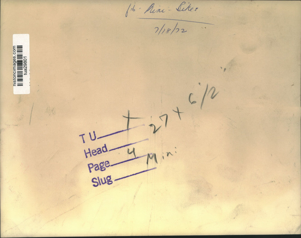 1972 Press Photo Boy pushes motorized minibike up New York street - tua29801