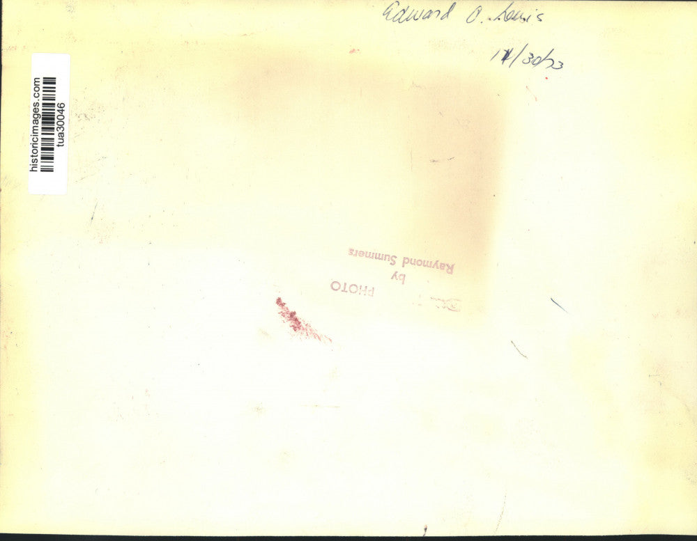 1973 Press Photo Edward O Lewis leans back on chair as he listens at a meeting