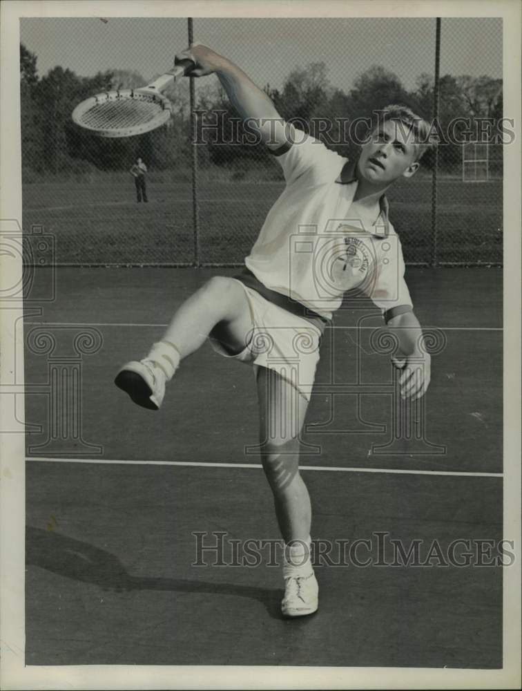 1962 Press Photo Tennis player Johnny Manne follows through on overhead smash- Historic Images