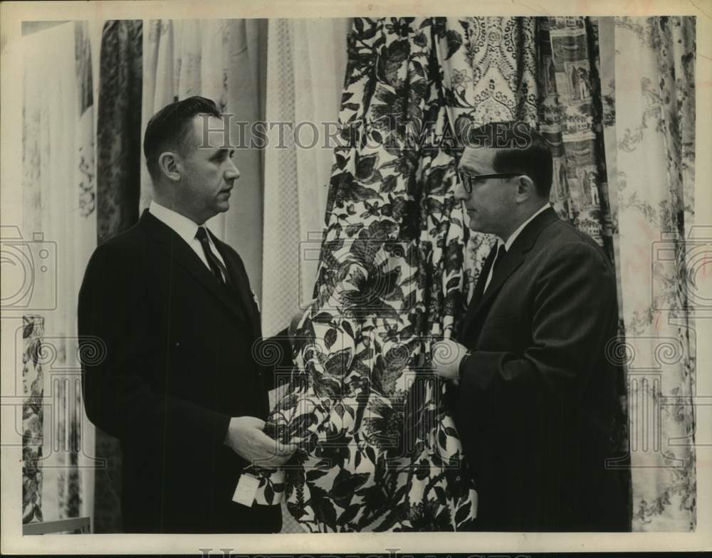 1964 Press Photo Donald Barnhart & Russell Marcus look at fabrics in Stuyvesant