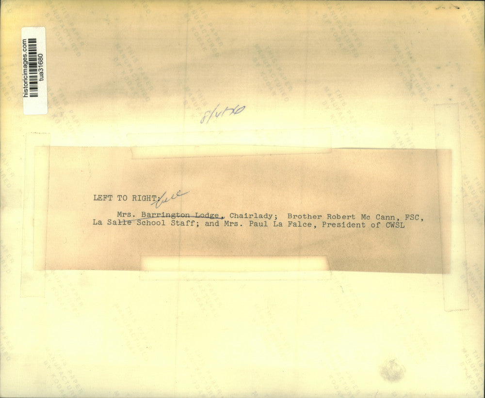 1976 Press Photo Group looks over program from Coliseum Theatre in New York