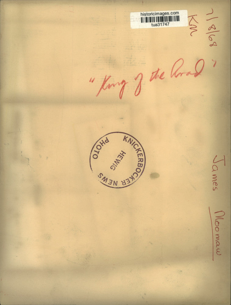 1968 Press Photo James Moomaw stands next to his bicycle as "king of the road"