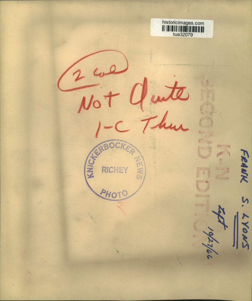 1966 Press Photo Frank Lyons checks register tape with staff in Albany, New York