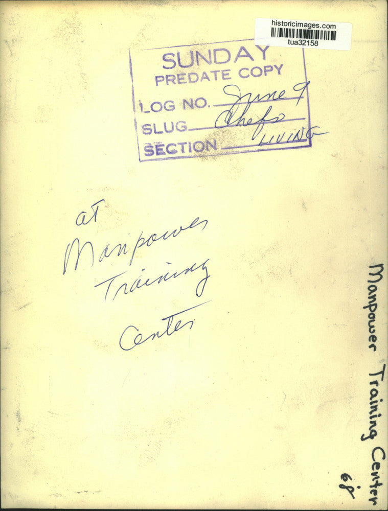 1968 Press Photo Woman prepares food at the grill at Manpower Training Center