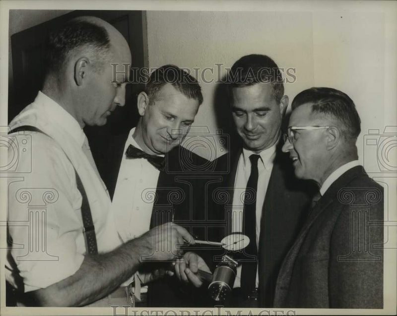 Load image into Gallery viewer, 1960 Press Photo F.C. Huyck officials discuss gauge at Rensselaer, NY plant
