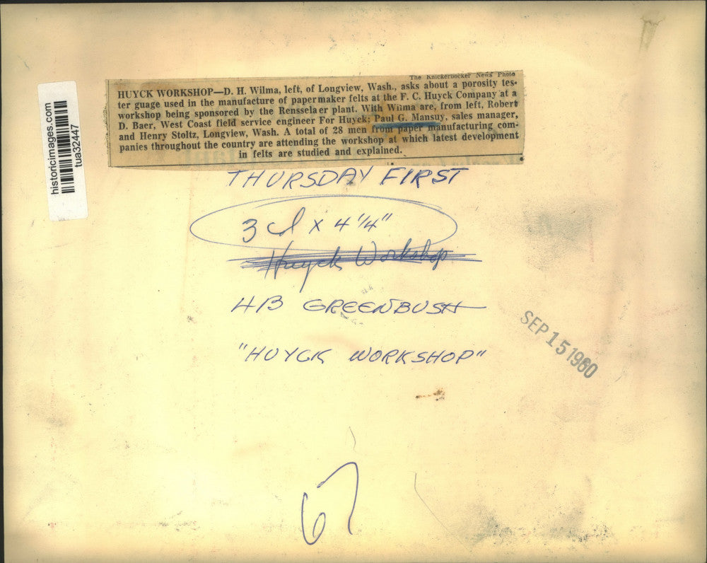 1960 Press Photo F.C. Huyck officials discuss gauge at Rensselaer, NY plant