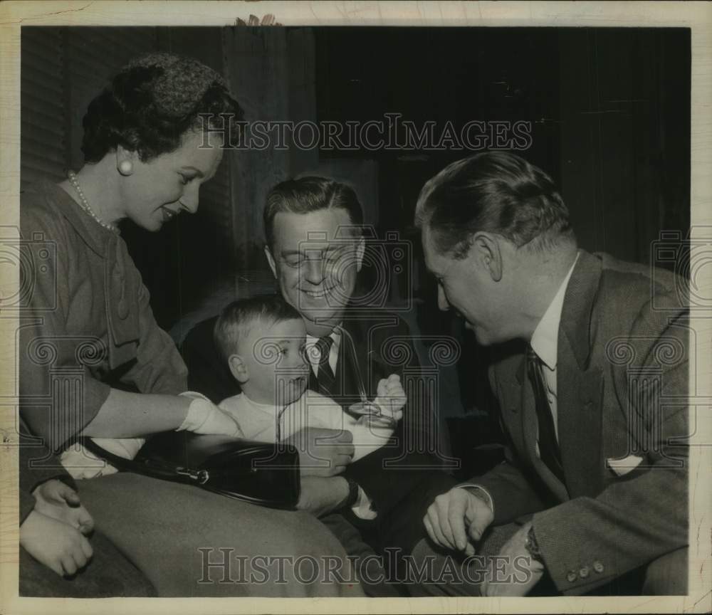 1961 Press Photo Infant tries New York Governor's glasses at ceremony in Albany