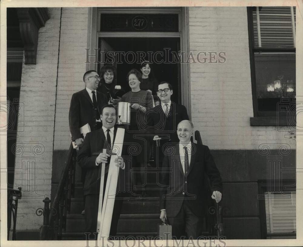 1967 Press Photo Donald J Moore poses on steps with Ad Agency employees