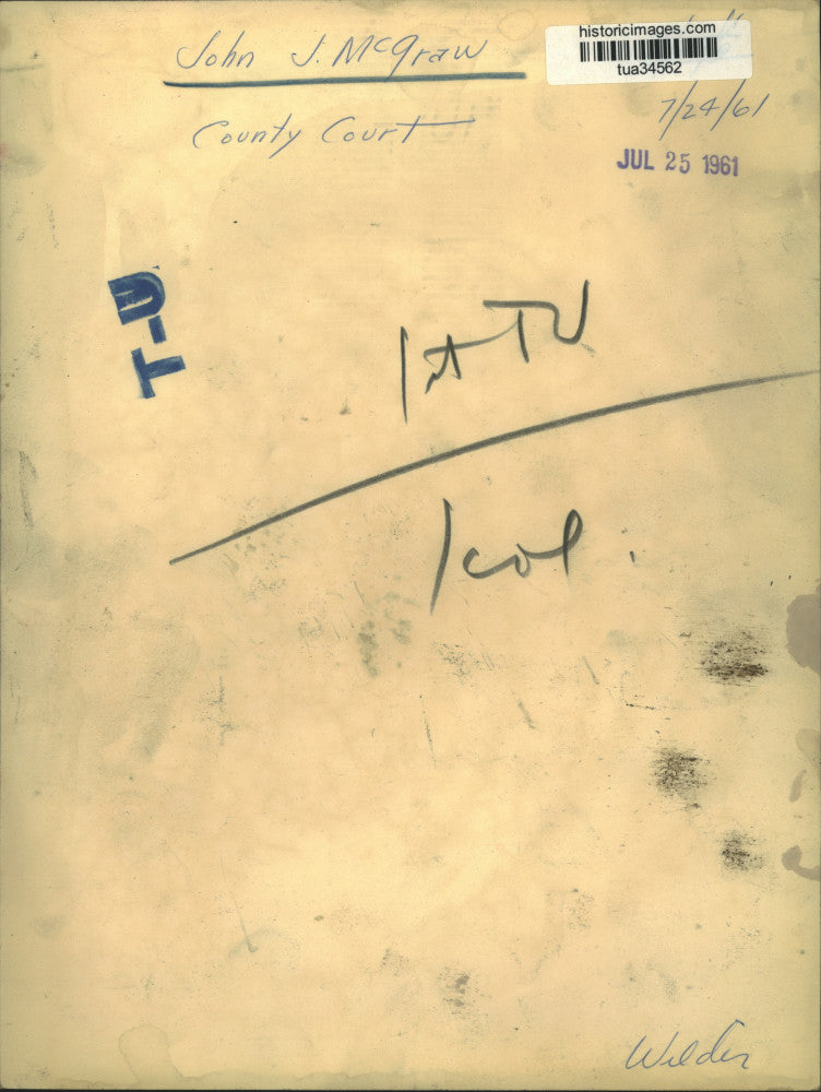 1961 Press Photo John J. McGraw smoking a cigarette at Albany, NY County Court