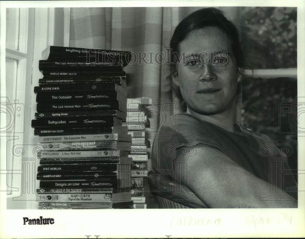 1992 Press Photo Jennifer McErleans with stacks of romance novels in Albany, NY- Historic Images