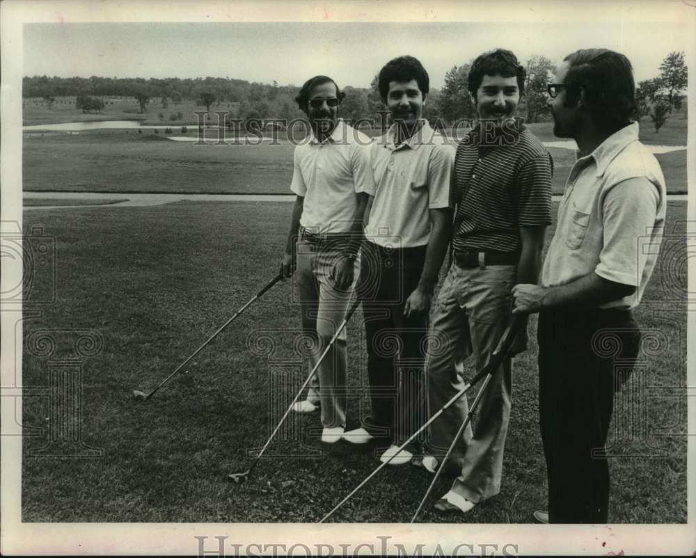 1973 Press Photo Foursome of golfers stands with their drivers at the tee box- Historic Images