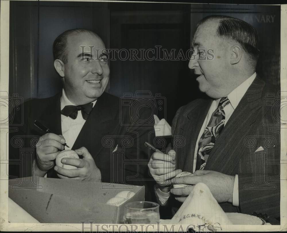 Press Photo Art Mann &amp; Tom McCaffrey sign baseballs in Albany, New York- Historic Images