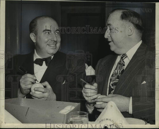 Press Photo Art Mann & Tom McCaffrey sign baseballs in Albany, New York- Historic Images