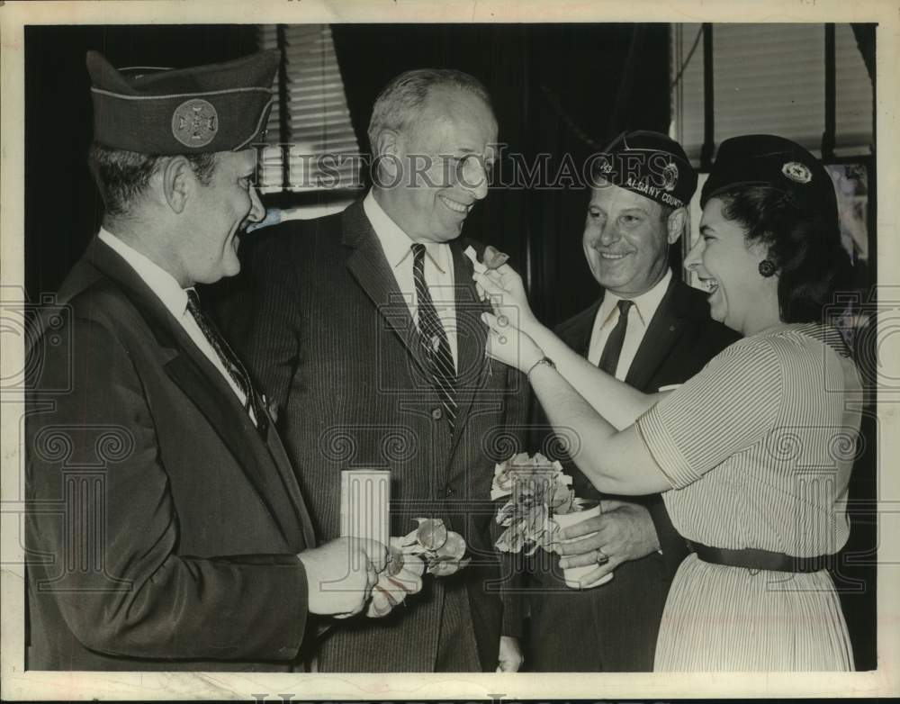 1961 Press Photo Albany, NY Mayor pinned with Memorial Day poppy in his office- Historic Images