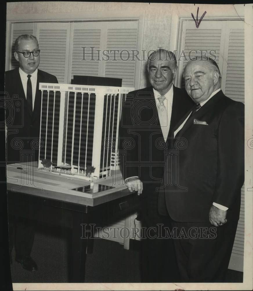 1969 Press Photo Businessmen show Twin Towers model to New York State Senator