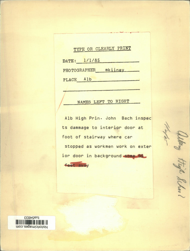 1985 Press Photo Principal inspects damaged door at Albany High School, New York