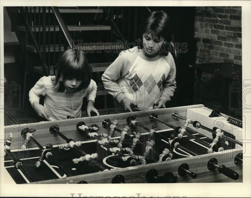 1989 Press Photo Girls play foosball at Girls Club in Albany, New York- Historic Images