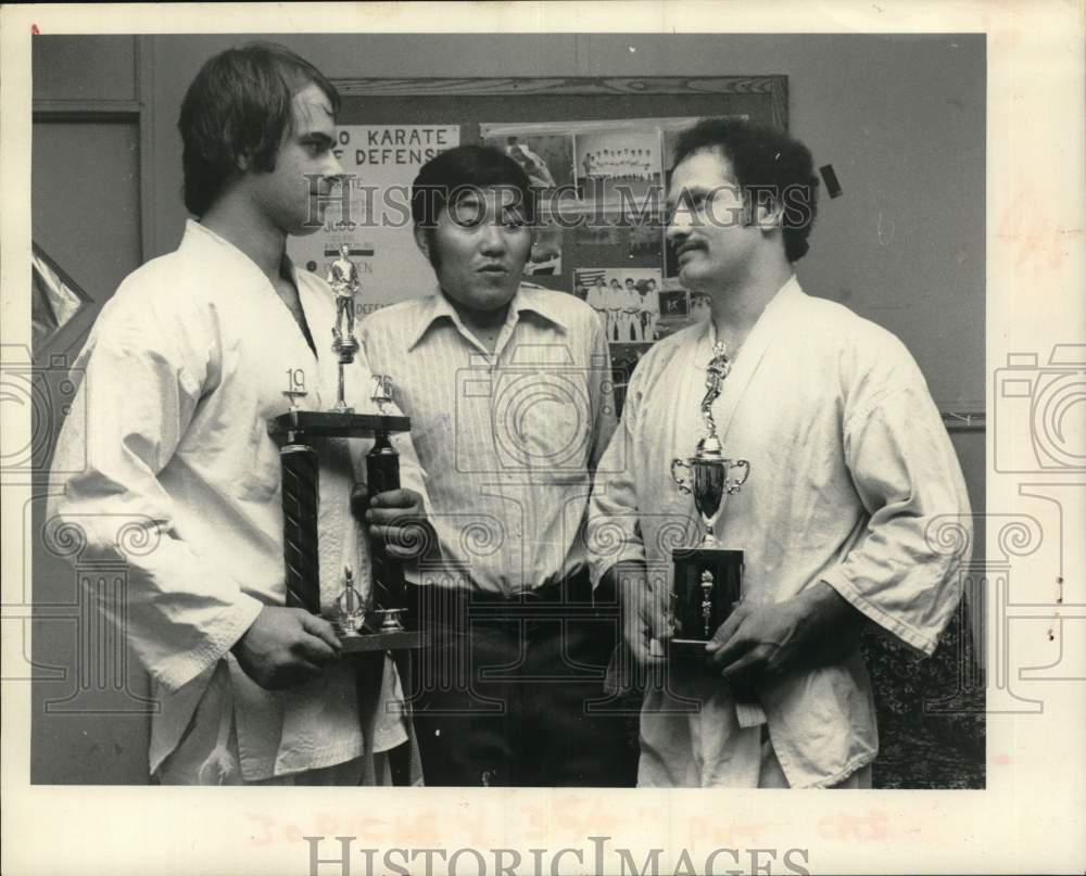 1976 Press Photo Martial artists pose with trophies in New York - tua58793- Historic Images