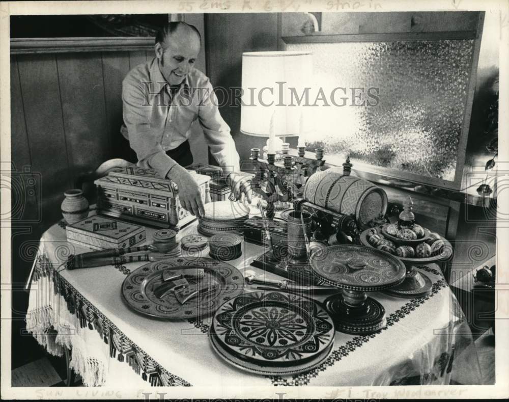 1972 Press Photo Michael Korhun with wood carvings in his New York home