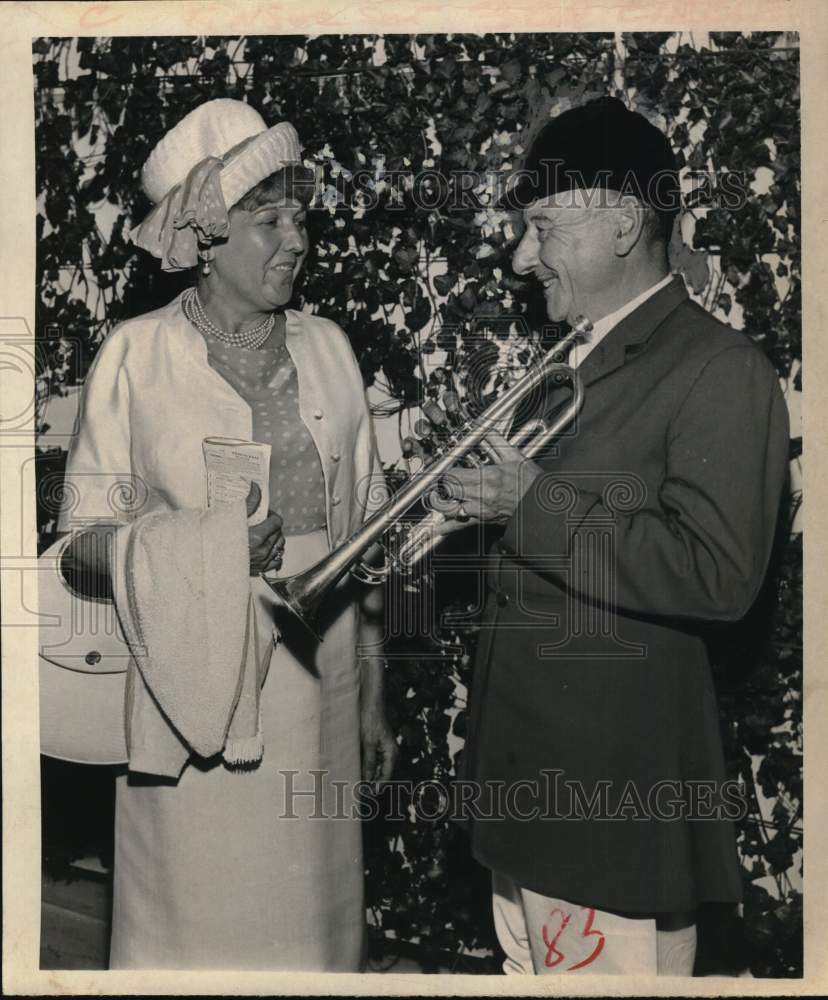 1965 Press Photo Trumpeter Shields Bruce talks to guest at New York horse track- Historic Images