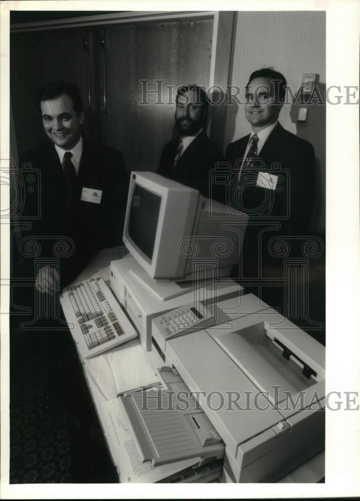 1994 Press Photo Business shows off new computer data storage system in New York- Historic Images