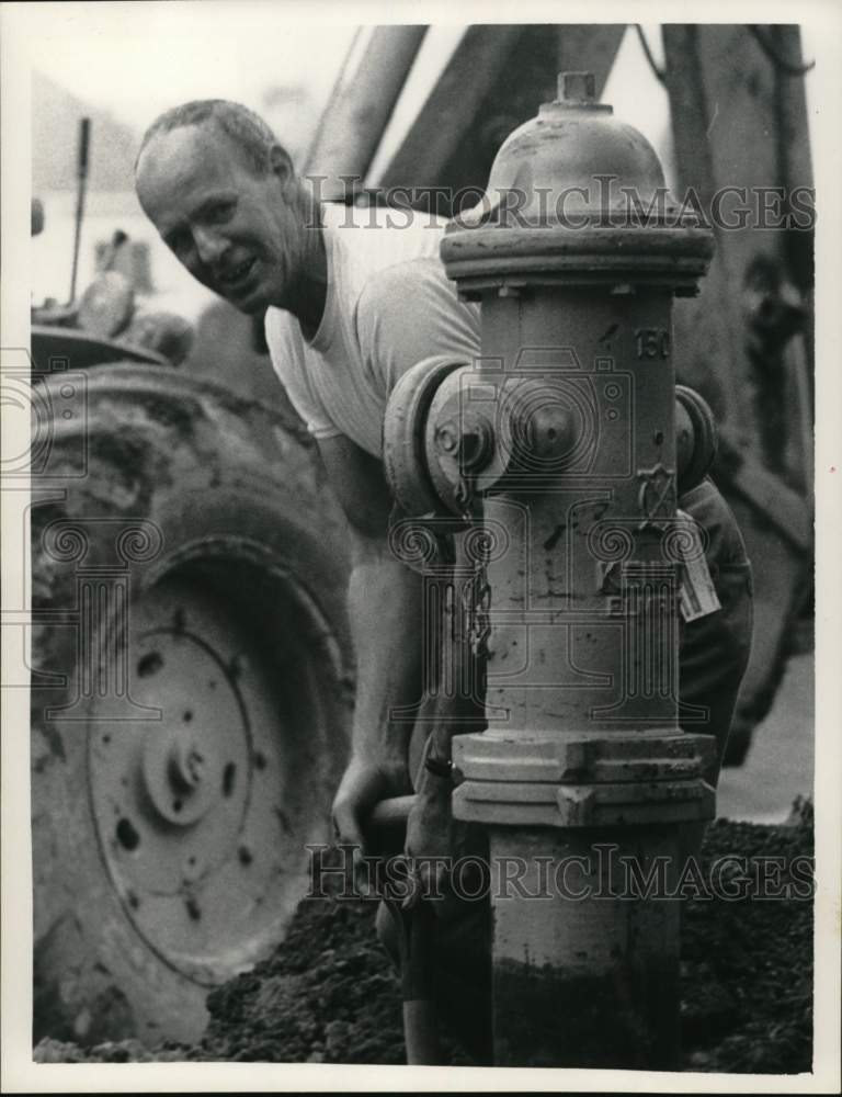 Press Photo Charles Armstrong with water hydrant in Dunnsville, New York- Historic Images