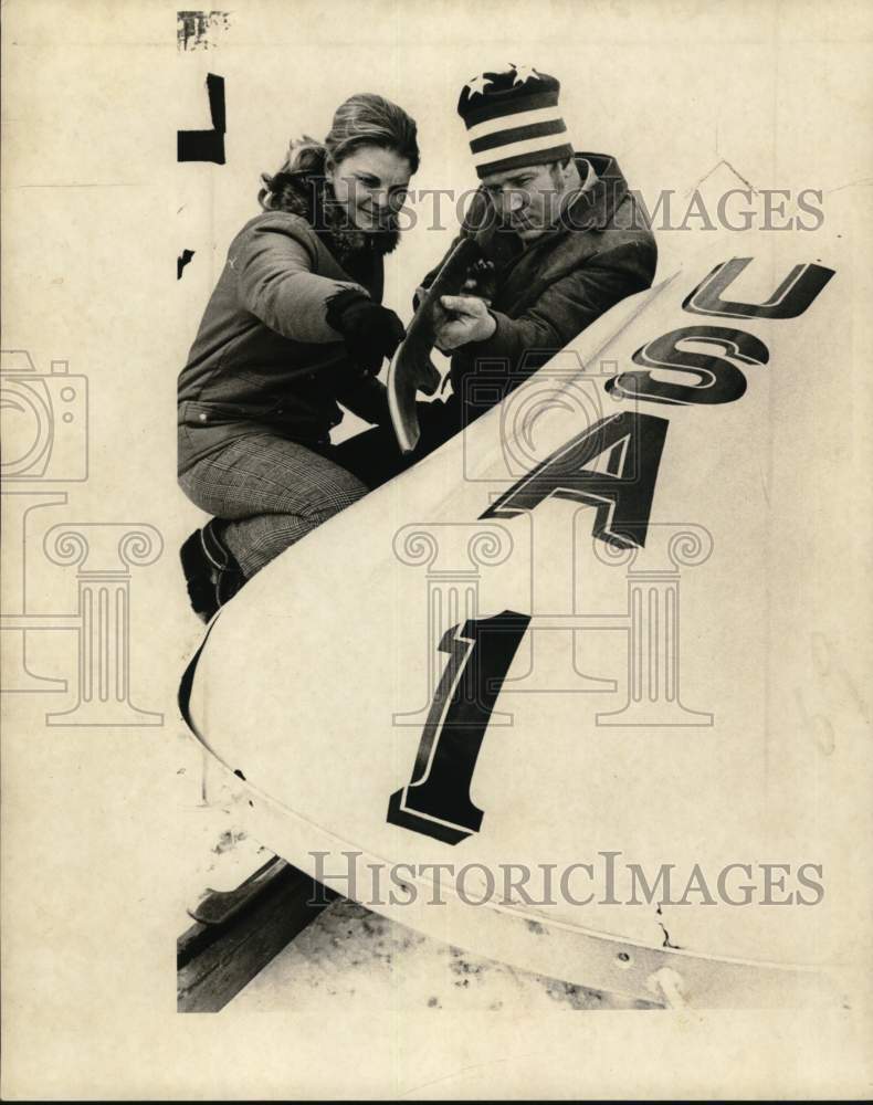 Press Photo Harry Peterson and wife with bobsled in New York - tua66522- Historic Images