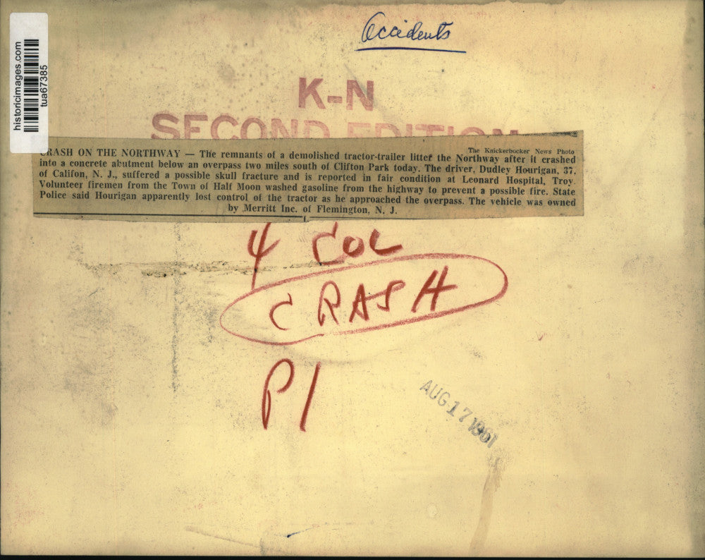 1961 Press Photo Bystanders survey debris from truck accident in New York