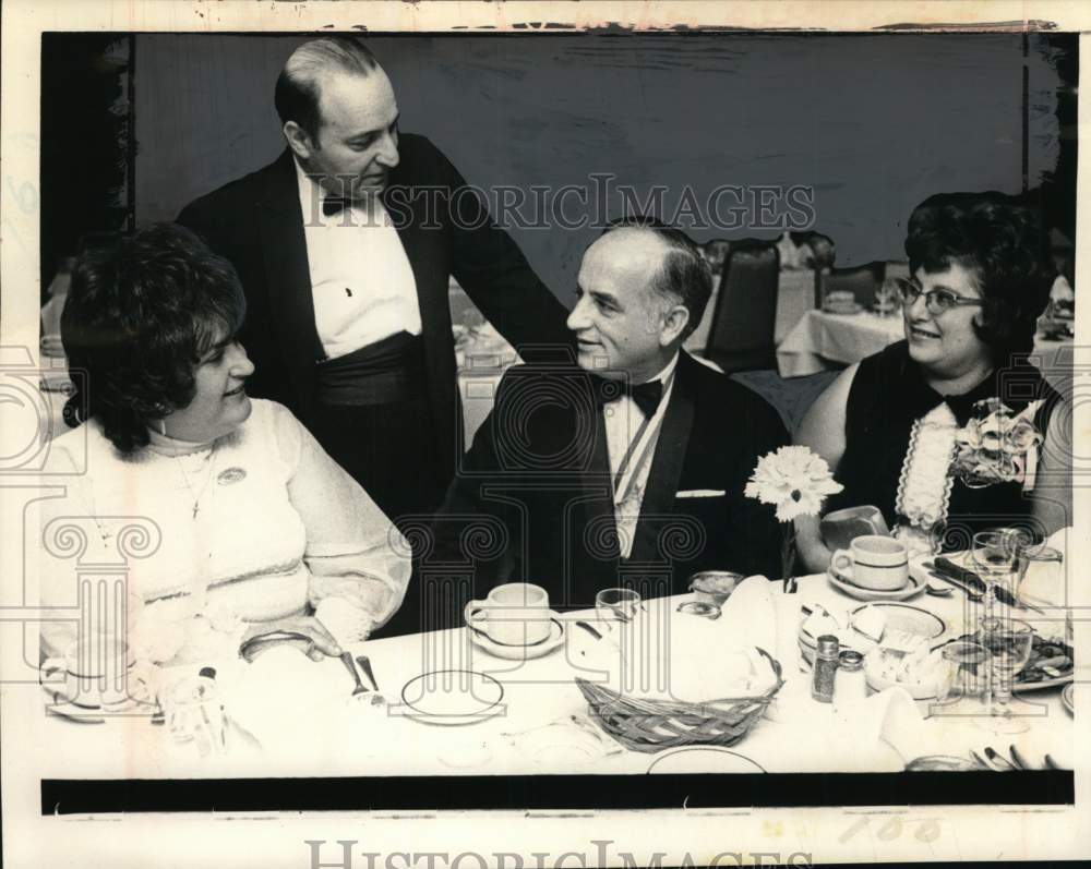 1972 Press Photo Couples chat at formal event in Albany, New York - tua75568- Historic Images