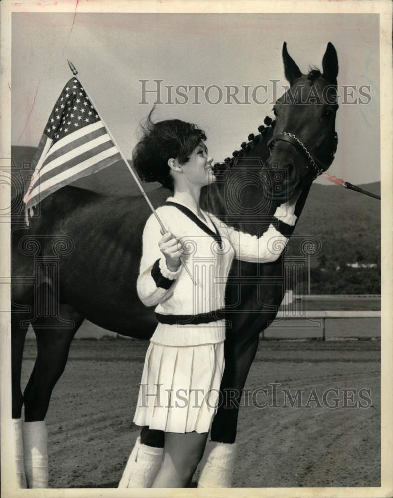 1968 Press Photo Woman petting racehorse Pat's Desire at track in New York- Historic Images