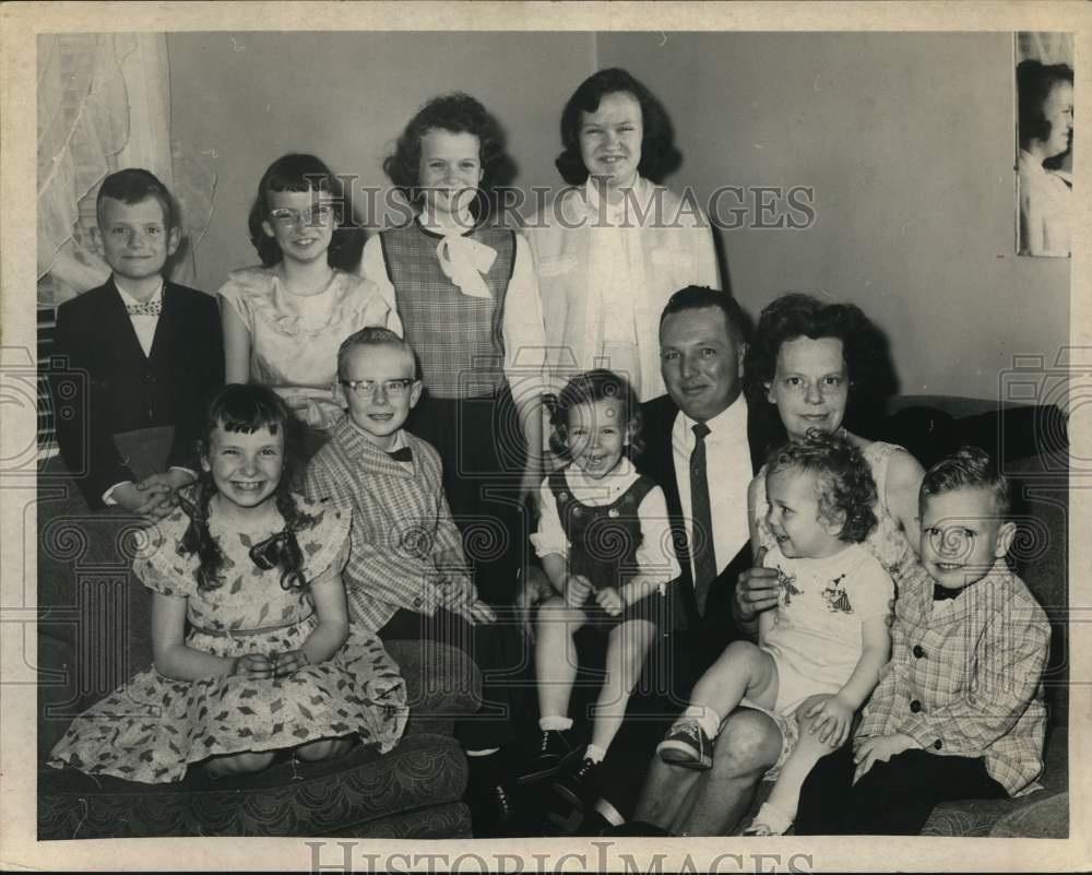 1964 Press Photo The Clark family poses in living room of their New York home