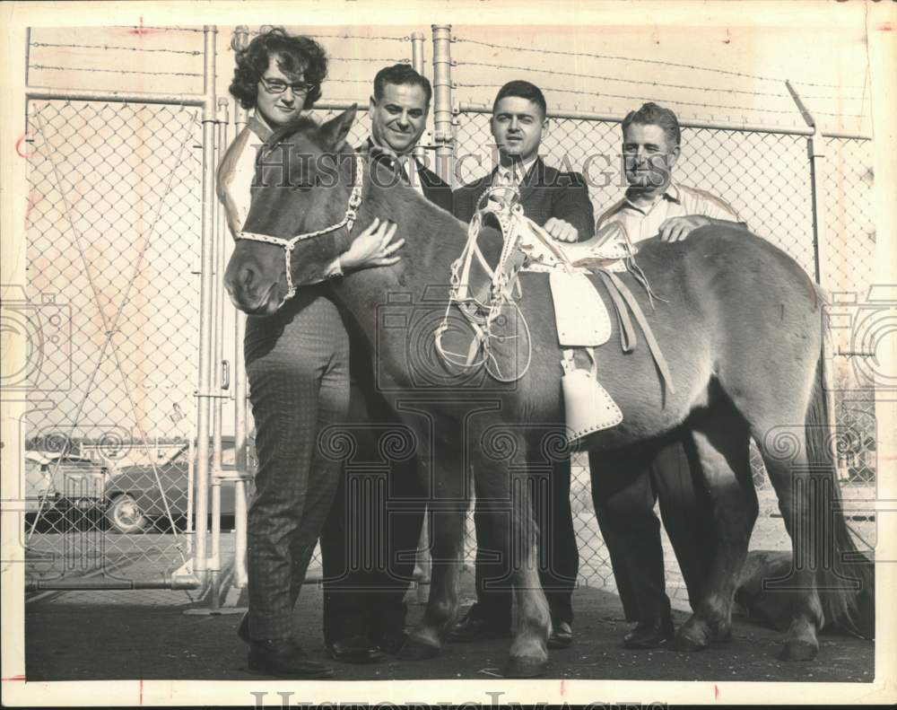 1963 Press Photo Group poses with pony to be given away in New York - tub00729
