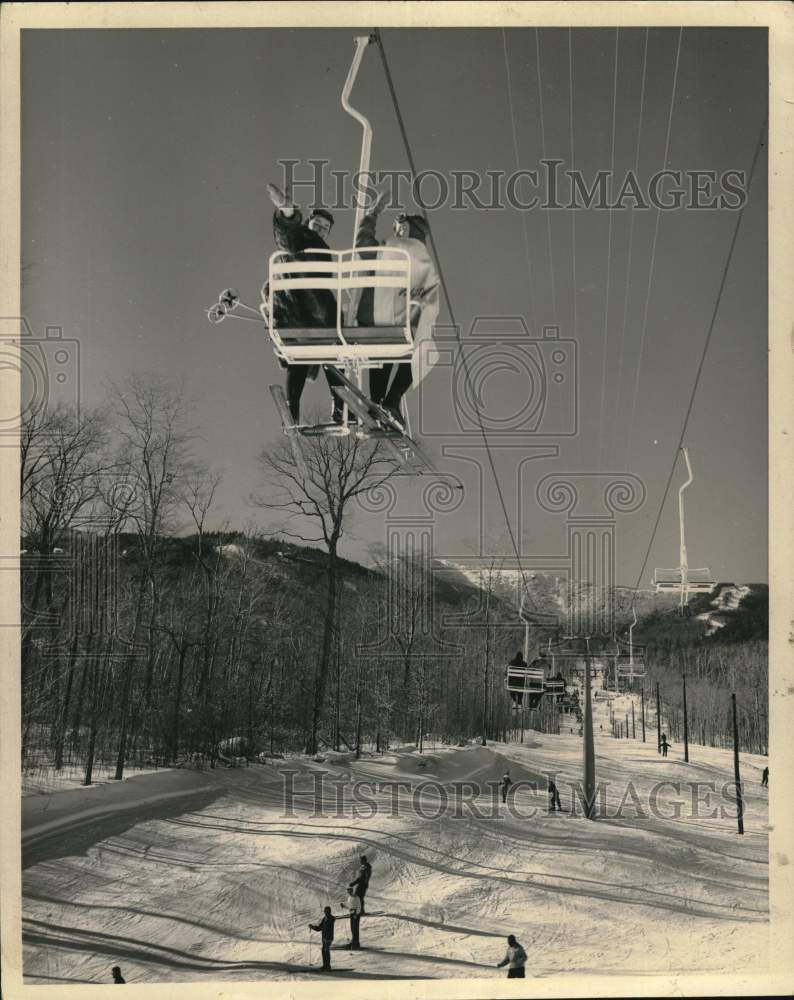 1969 Press Photo Skiers ride a chairlift at Whiteface Mountain, New York- Historic Images