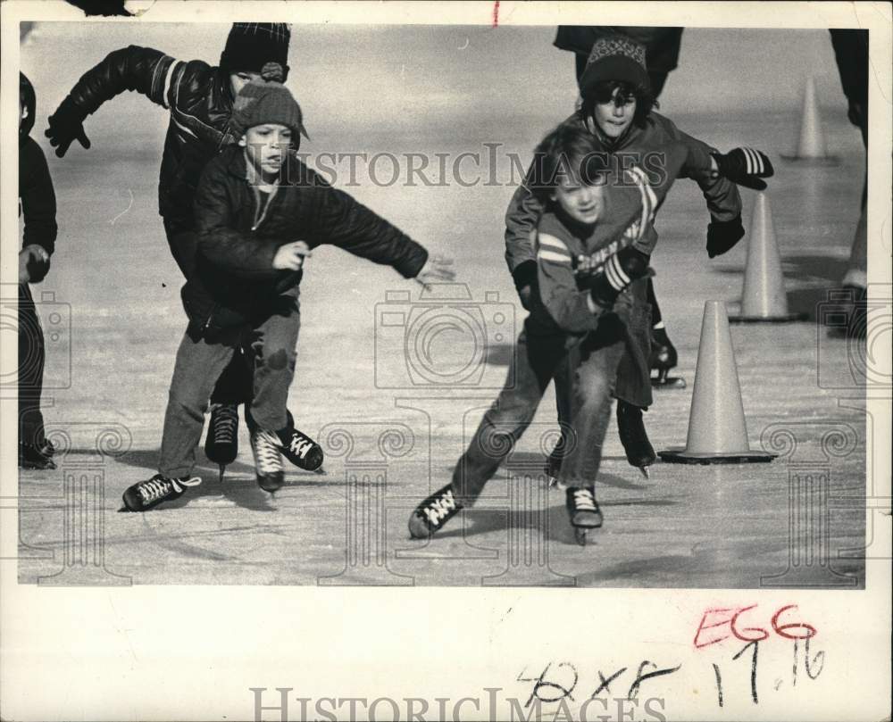 1975 Press Photo Ice skaters in action - tub08370- Historic Images