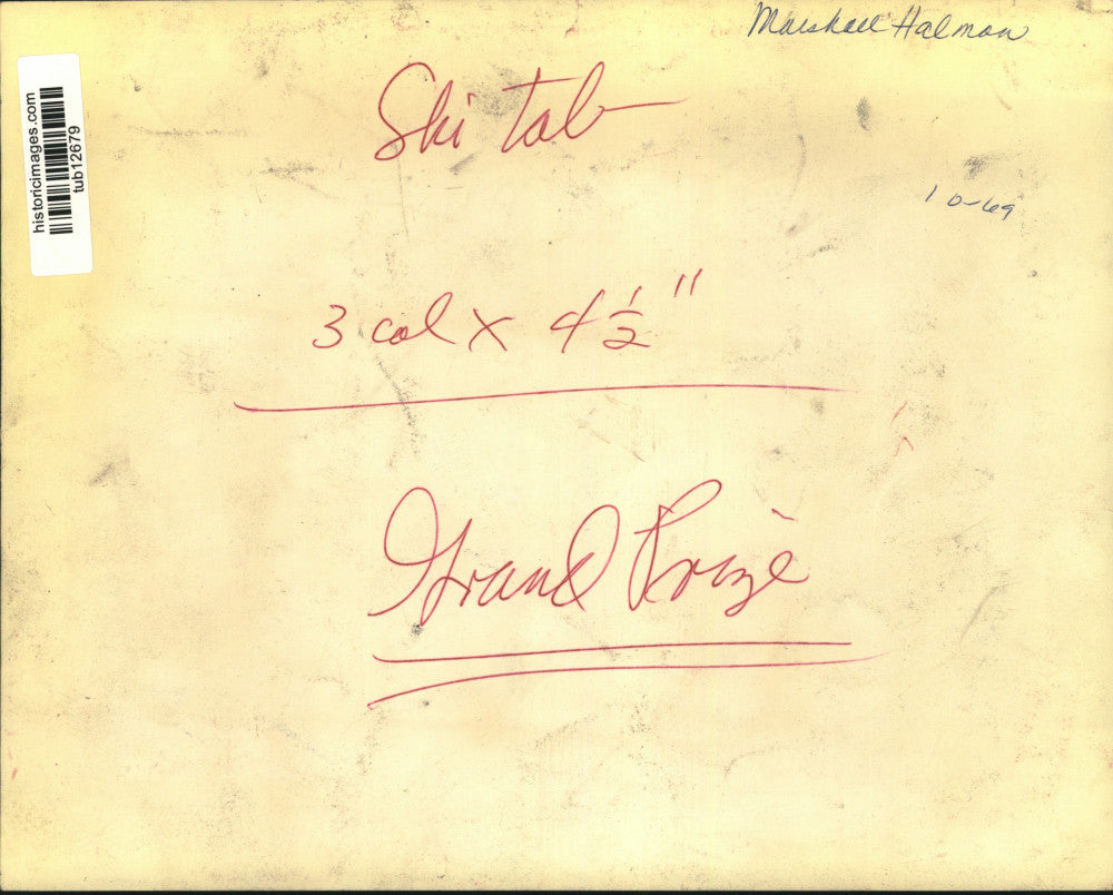 1969 Press Photo Marshall Hallman poses with contest prize car in New York