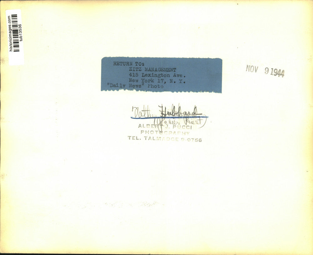 1944 Press Photo Father Hubbard, glacier priest, looks at map - tub13536