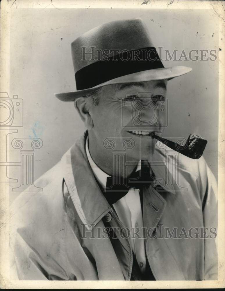 1961 Press Photo Actor Robert Young Smokes Pipe - tub17652- Historic Images