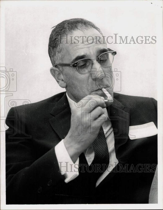1964 Press Photo Theodore Tannenwald, Jr. Smokes Cigarette - tub20411