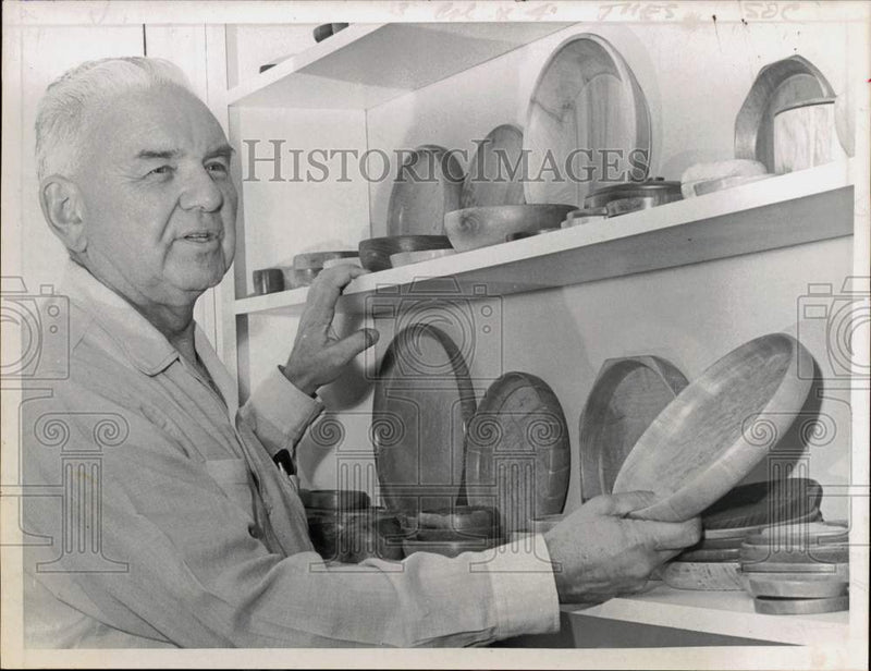 Load image into Gallery viewer, 1966 Press Photo Dr. C.M. Suter Shows Display of Finished Wood Plates and Bowls
