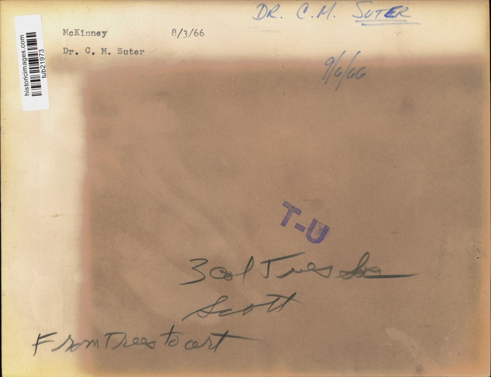 1966 Press Photo Dr. C.M. Suter Shows Display of Finished Wood Plates and Bowls