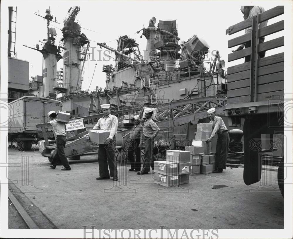 Press Photo Crewmen Carry Supplies on the USS Albany - tub24884- Historic Images