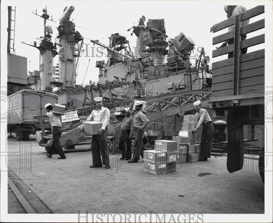 Press Photo Crewmen Carry Supplies on the USS Albany - tub24884- Historic Images