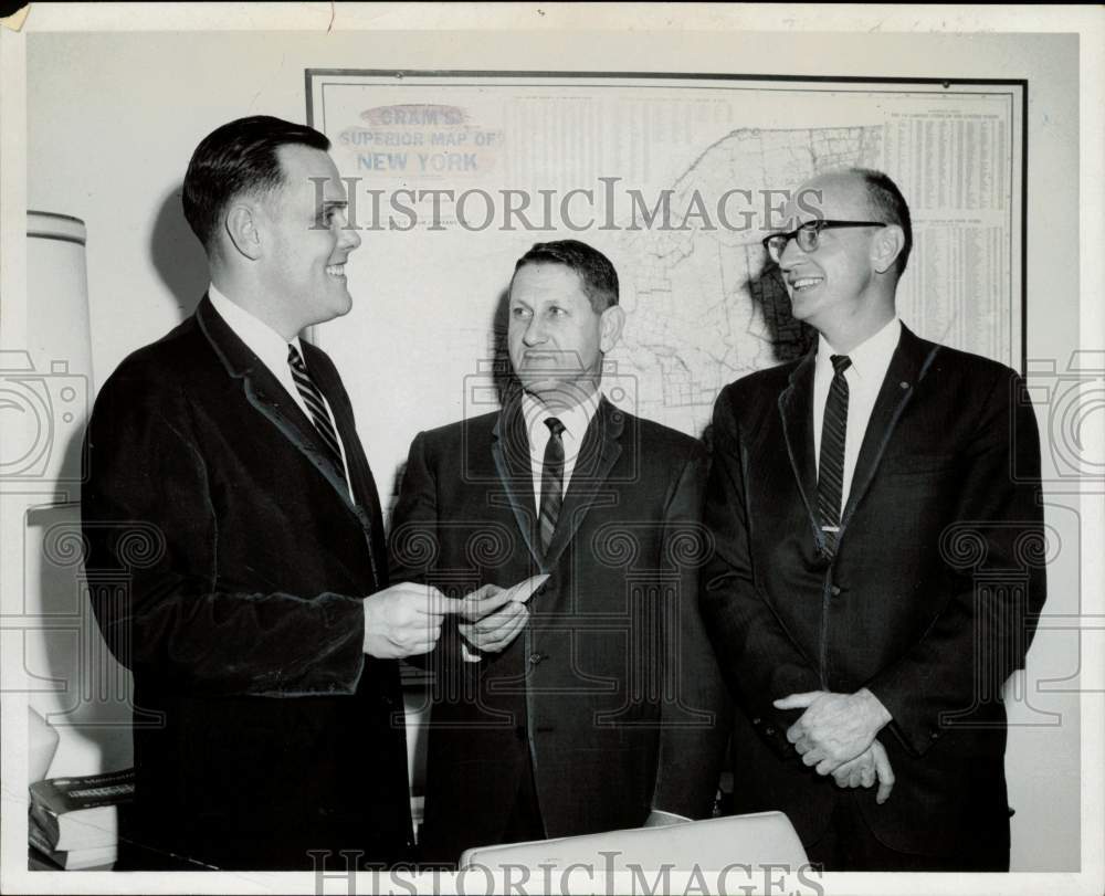 1964 Press Photo Werner K. Stiefel chatting with colleagues near map of New York- Historic Images