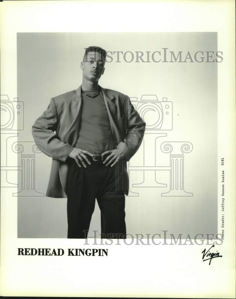 1991 Press Photo Singer Redhead Kingpin stands with hands on hips - tup03747- Historic Images