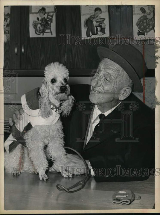 1961 Press Photo Jimmy Durante with his wife's french poodle, Pierre - tup21228- Historic Images