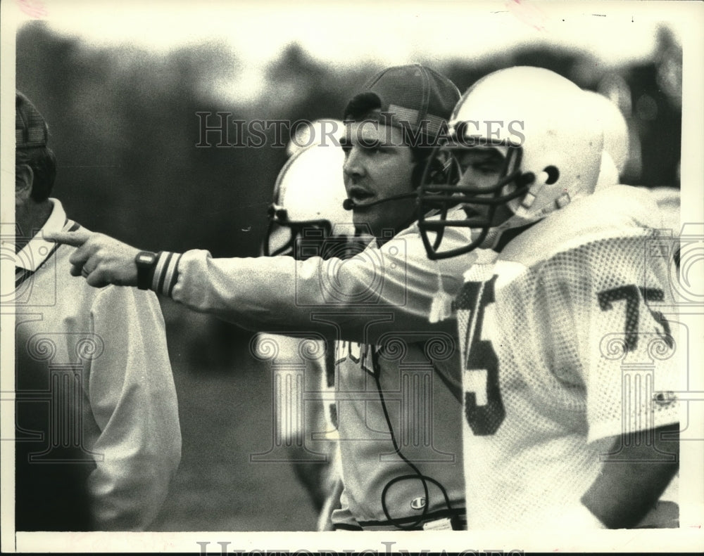 1985 Press Photo Troy High School Football coach talks to player #75 - tus01212- Historic Images