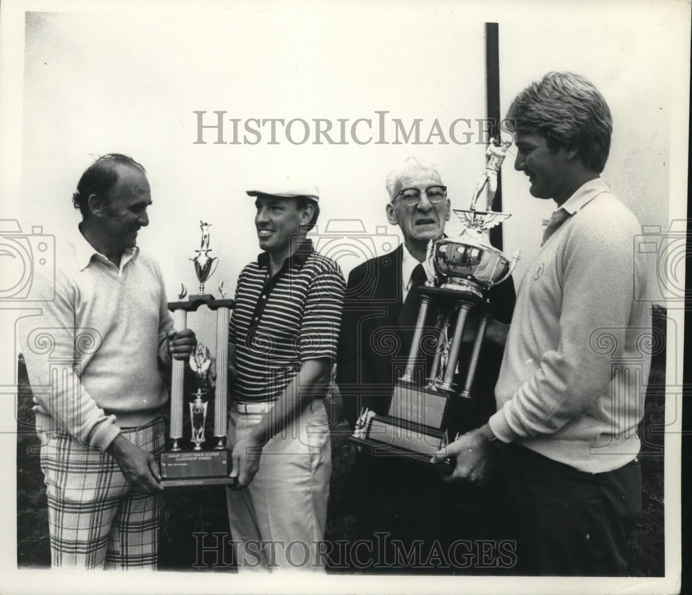 Press Photo Golfers display tournament trophies in New York - tus01415- Historic Images