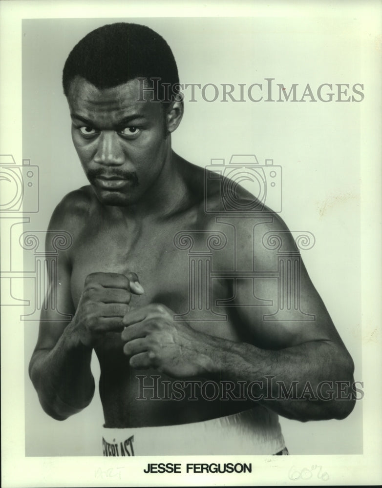 Press Photo Boxer Jesse Ferguson poses for photo with fists raised - tus01675- Historic Images